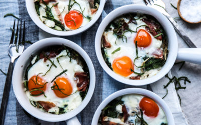 Baked Eggs with Maitake, Spinach, Prosciutto, and Goat Cheese